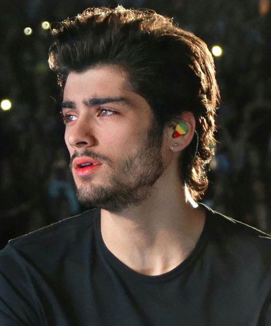 Not so hair-raising! Zayn Malik ditches the quiff and opts for a shaggy  flat 'do in Japan
