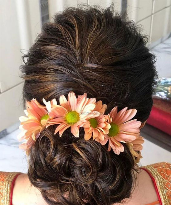 Bun Hairstyles for Engagement in Lehenga for Bride