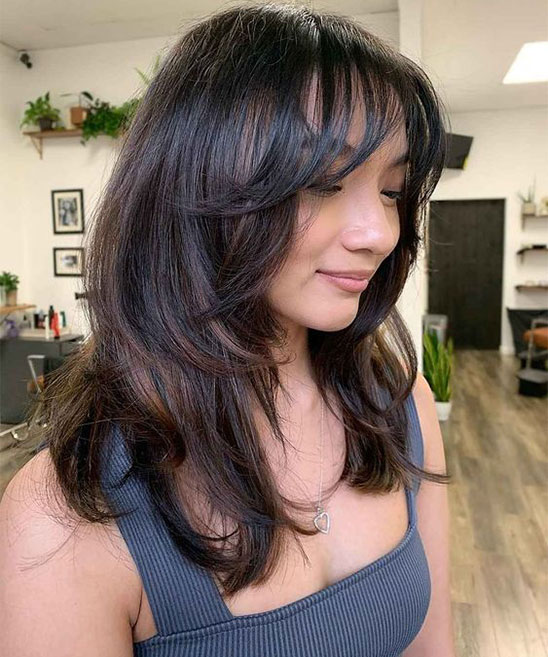 Haircuts for Thick Wavy Hair Medium Length