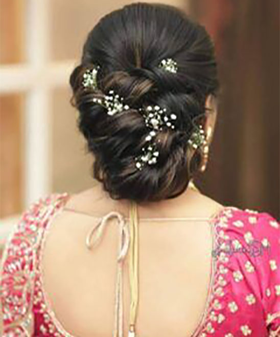 Reception Bun Hairstyle for Red Saree | Photo Gallery - Wedandbeyond.com
