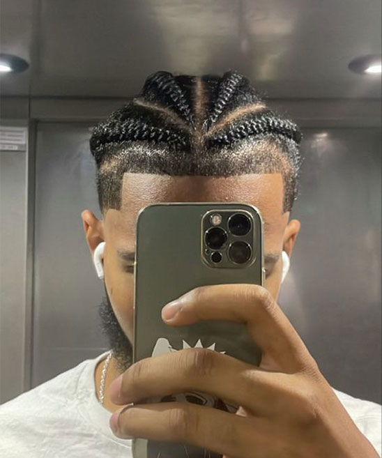 Man with Cornrows