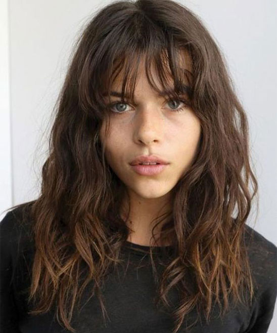 Wispy Bangs with Face Framing Layers