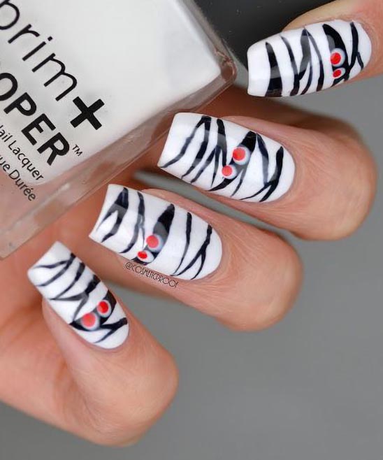 BLACK WHITE AND RED HALLOWEEN NAILS