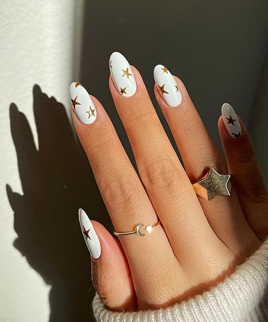 GOLD AND WHITE DESIGN NAILS