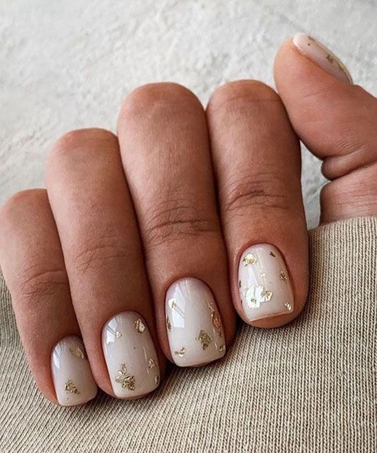 GOLD AND WHITE NAILS DESIGN