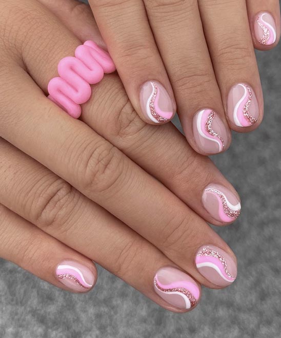 PINK AND WHITE CHRISTMAS NAIL DESIGNS