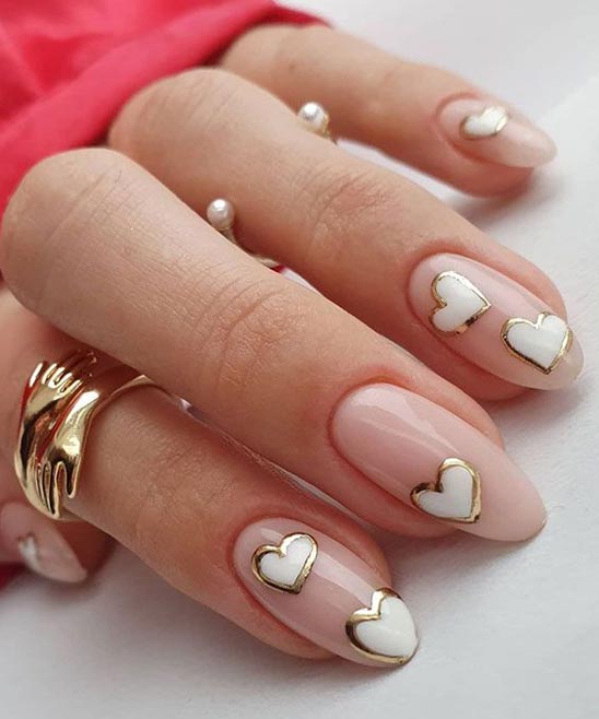 WHITE ACRYLIC NAILS WITH DESIGNS
