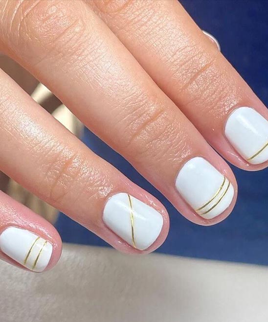 WHITE AND GOLD ACRYLIC NAIL DESIGNS