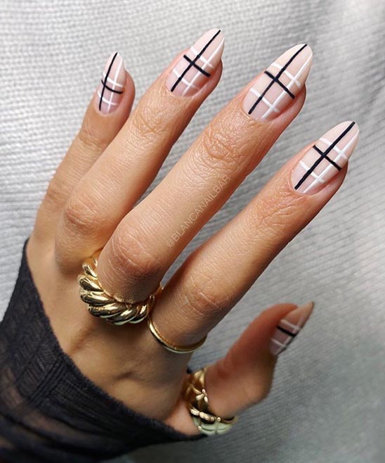 WHITE FRENCH TIP NAILS WITH BLACK DESIGN