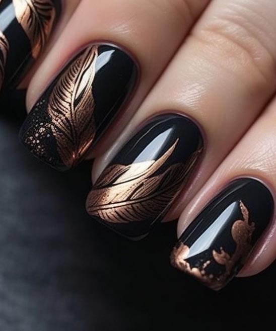 Black and Gold Almond Acrylic Nails