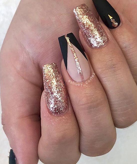 Black and Gold Almond Nails
