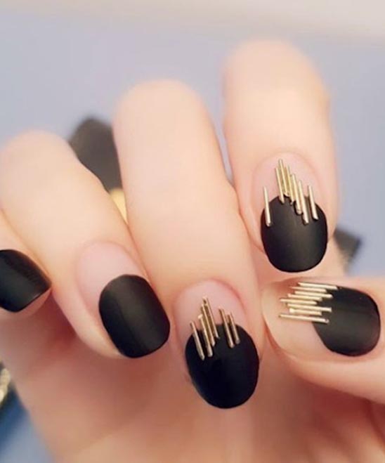 Black and Gold Ombre Nails