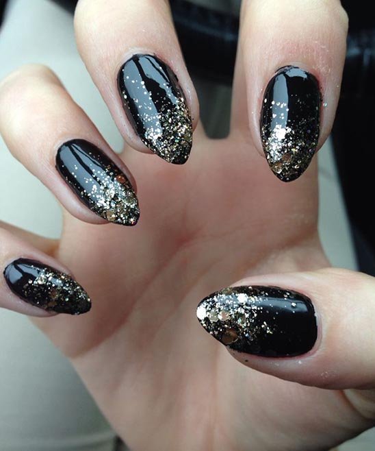 Black and Gold Pointy Acrylic Nails