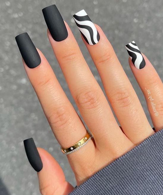Black and Rose Gold Stiletto Nails