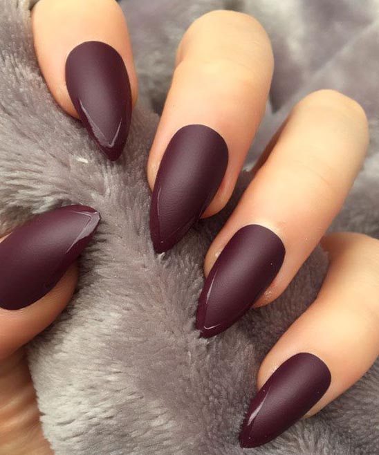 Burgundy Nails With Gold Ring Finger
