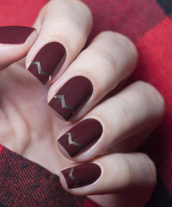 Burgundy Nails With Rose Gold