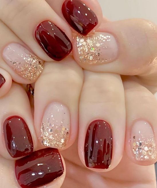 Burgundy and Gold French Tip Nails
