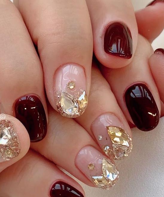 Burgundy and Gold Prom Nails