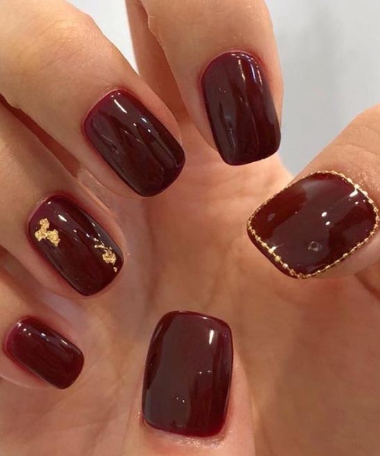 Burgundy and Gold Sparkle Nails