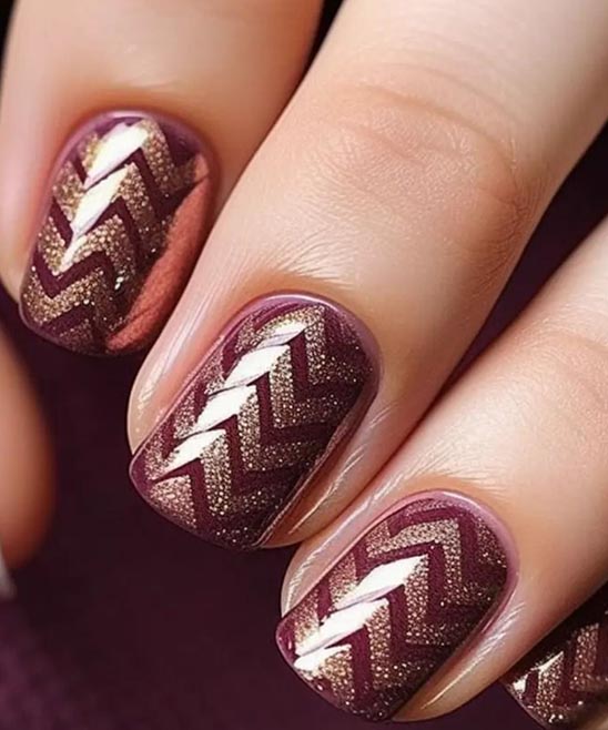 Burgundy and Gold Stiletto Nails