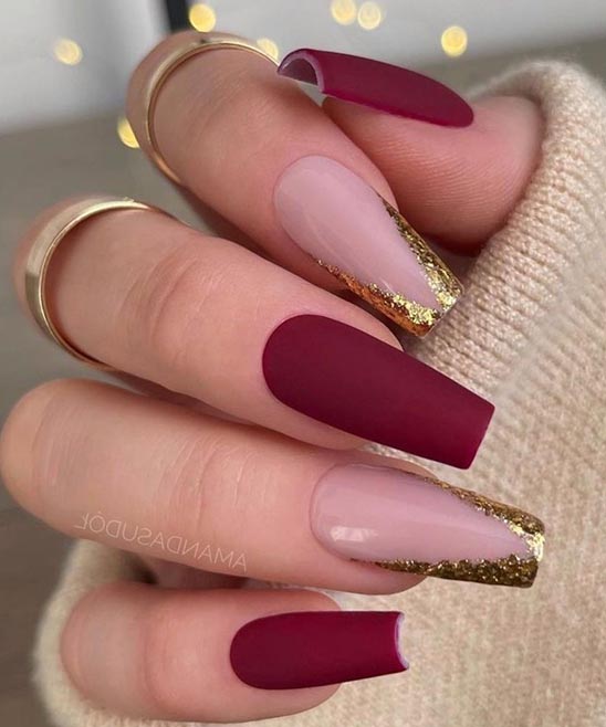 Burgundy and Gold With Flowers Nails