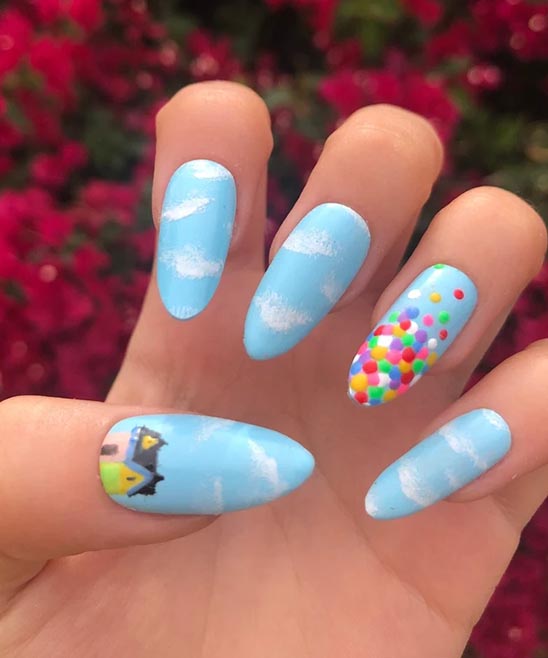 Light Blue Nails With White Designs