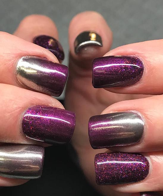 Light Purple Nails With Blue Design