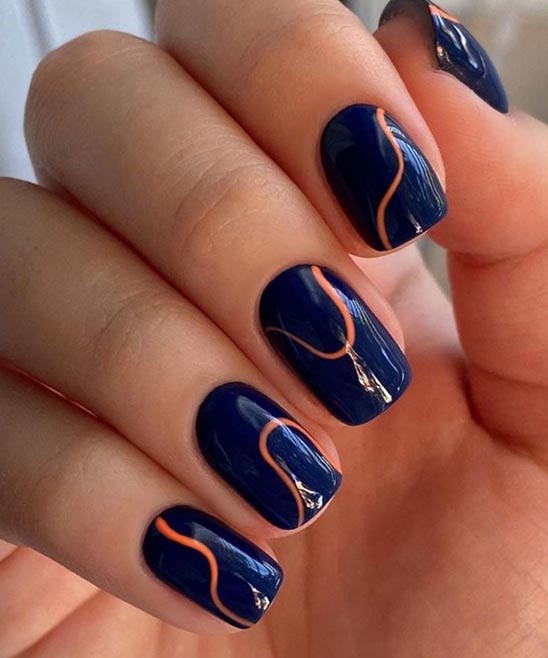 Navy Blue and Gold Nail Design