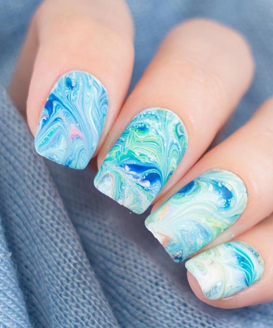 Pink White and Blue Nail Designs