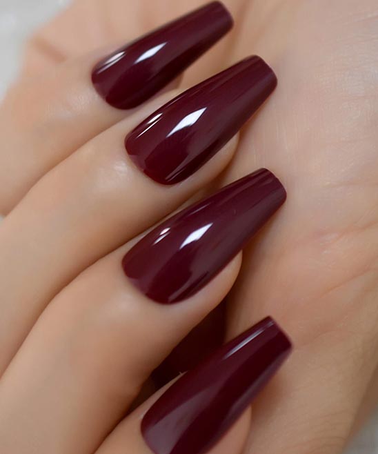 Pinterest Burgundy Nails With Different Gold Stipe on Each Nail