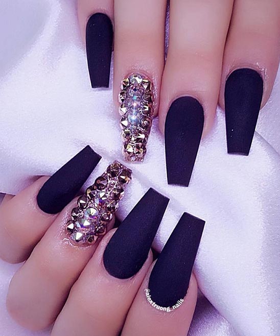 Pretty Rose Gold and Black Nails