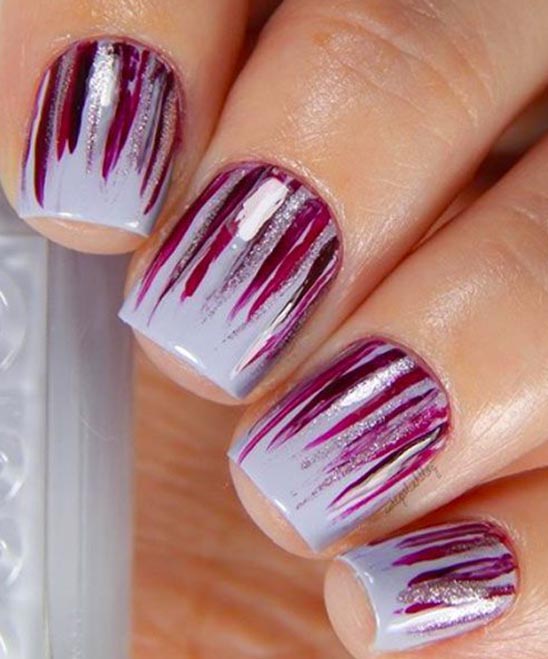 Purple Stiletto Nail Designs