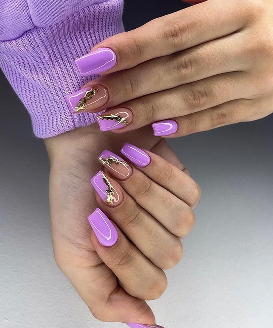 Purple Stiletto Nail Designs.jpg