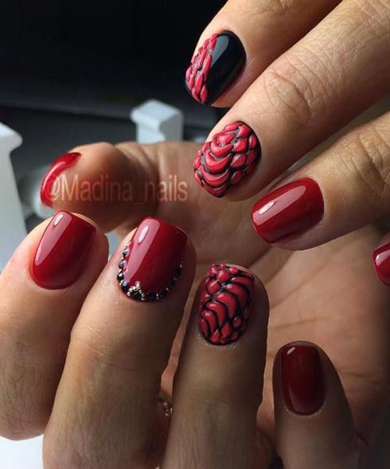 Red Nails With Black and White Designs