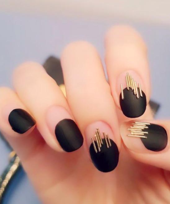 Rose Gold and Black Nails