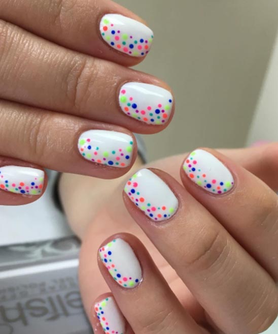 White Nail Polish With Black Design