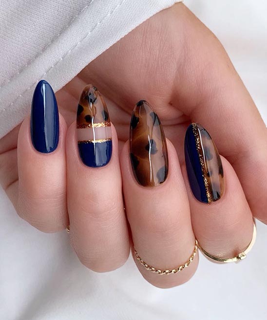 White Nails With Navy Blue Design