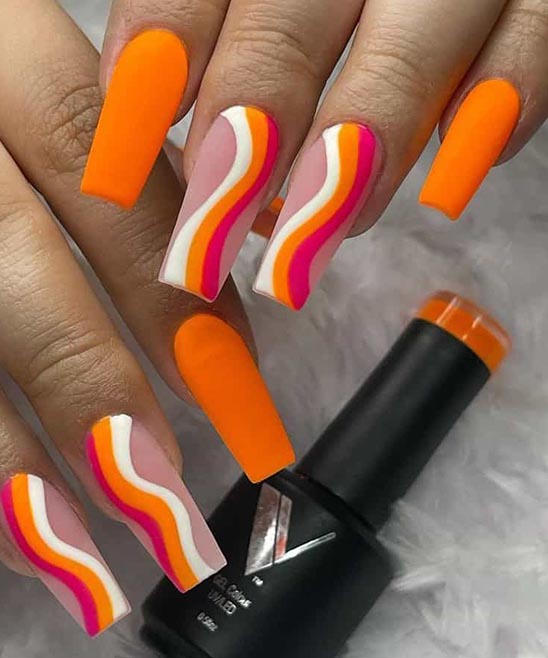 Almond Acrylic Nails With Gel Polish Orange and Gold