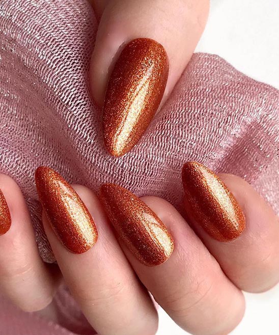 Almond Nails With Gold Tips