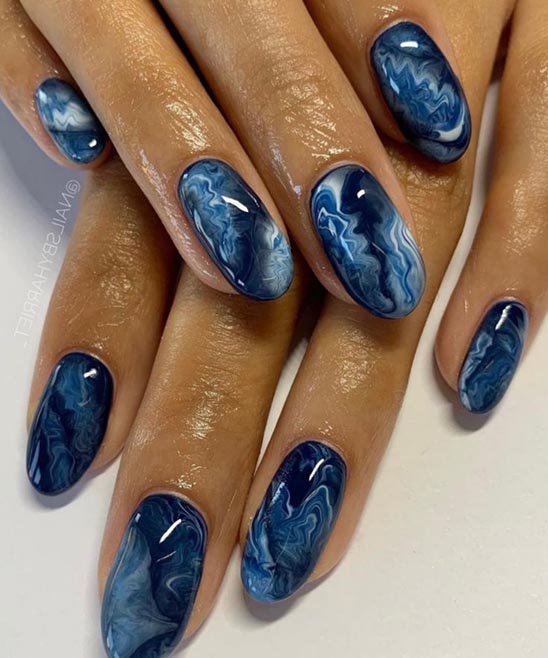 Big Toe Flower Nail Design on Blue Polish