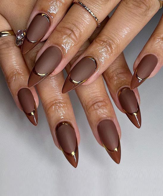 Black and Gold Almond Shaped Nails