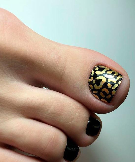 Black and Orange Toes Nails Designs