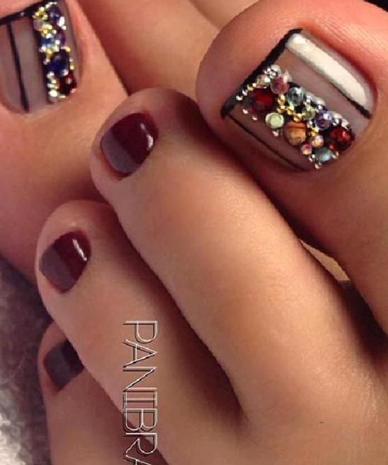 Black and Silver Toe Nails