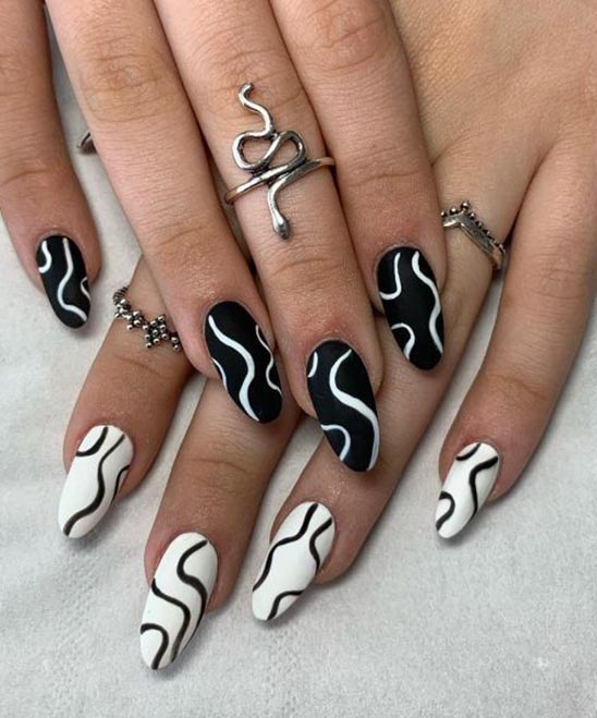 Black and White French Tip Almond Nails