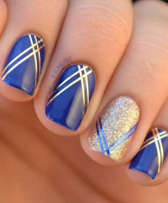 Blue Black and Gold Nails