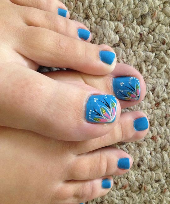 Blue and Gold Toe Nails