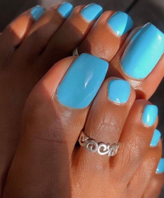 Blue and Orange Toe Nail Designs