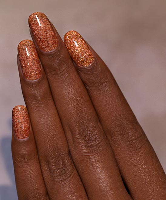 Burnt Orange Nails on Dark Skin