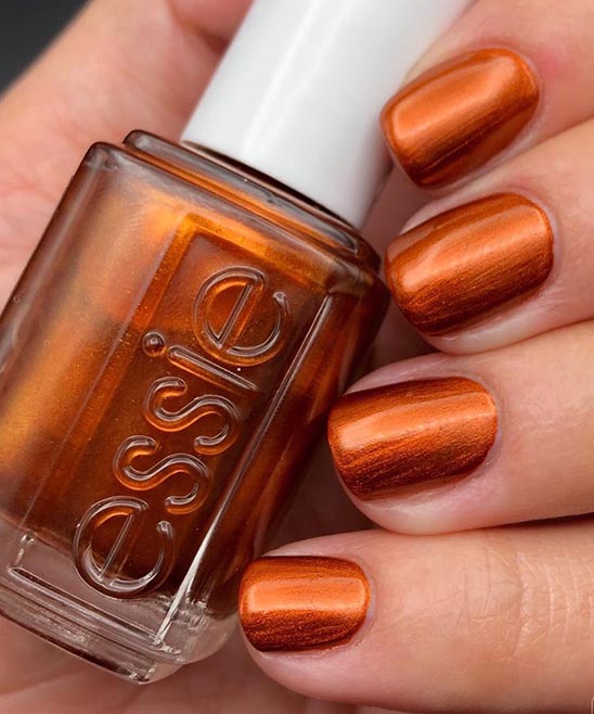 Burnt Orange and Blue Nails