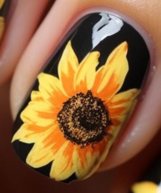 Classy Black and Gold Coffin Nails